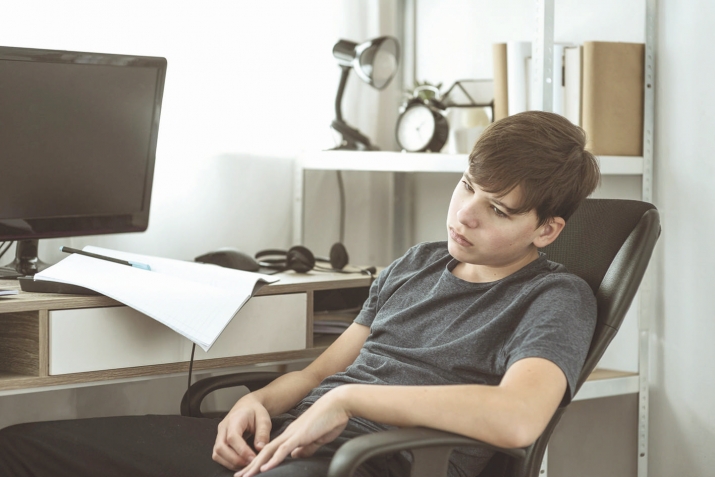 A teenager: not yet an adult but no longer a child