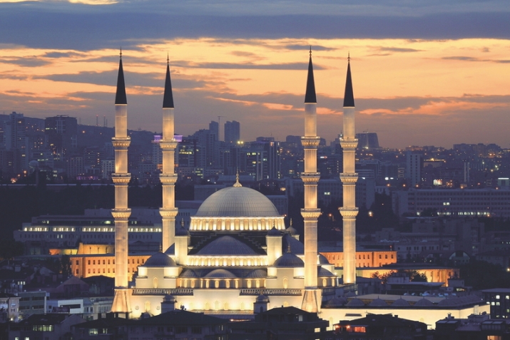 Why are mosques built with minarets?